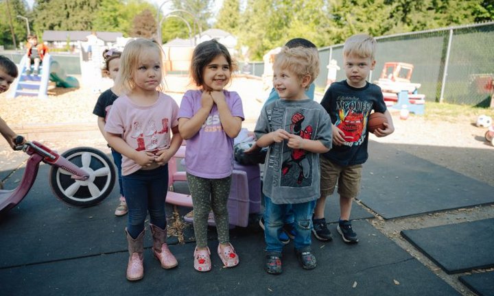 Preschool friends playing at Lil' Patriots Academy Spanaway campus, showcasing engaging and interactive learning environments.