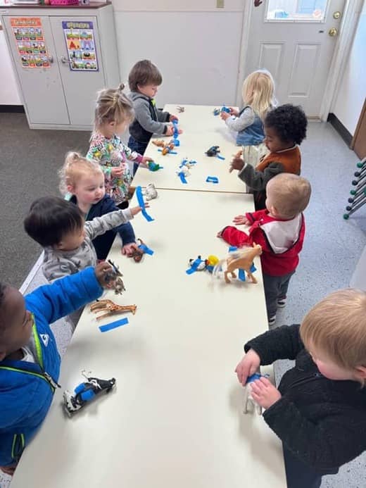 Children enjoying outdoor playtime at Lil' Patriots Academy, demonstrating our safe, engaging outdoor facilities in Puyallup.